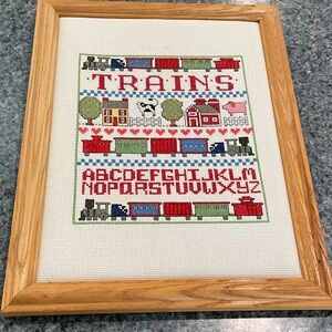 Cross stitched train/alphabet framed tapistary